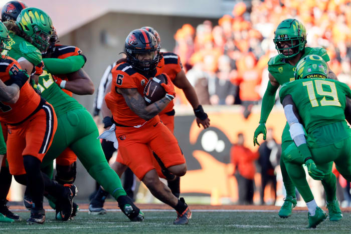 Nov 26, 2022; Corvallis, Oregon, USA; Oregon State Beavers running back Damien Martinez (6) runs the ball during the first half against the Oregon Ducks at Reser Stadium. Mandatory Credit: Soobum Im-USA TODAY Sports